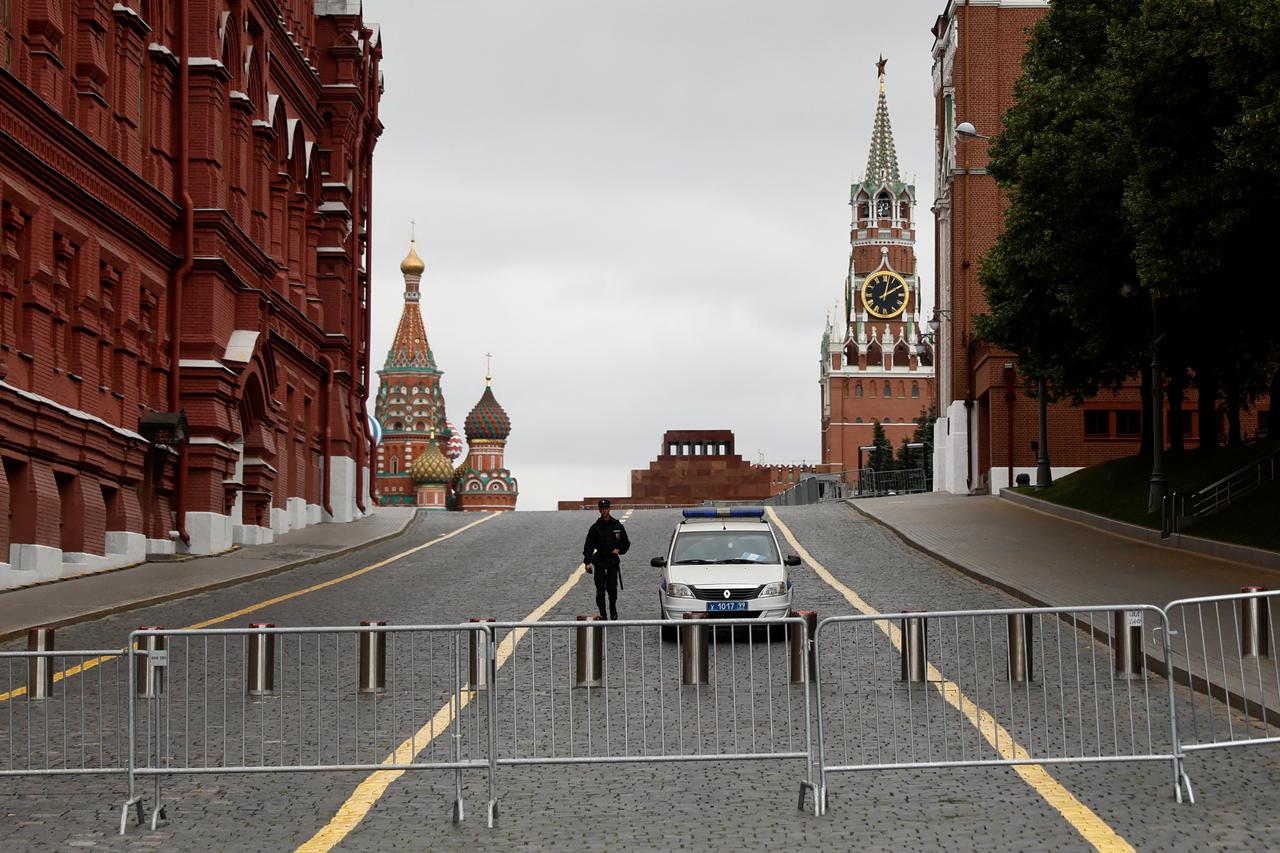 A police officer guards the closed Red Square in Moscow