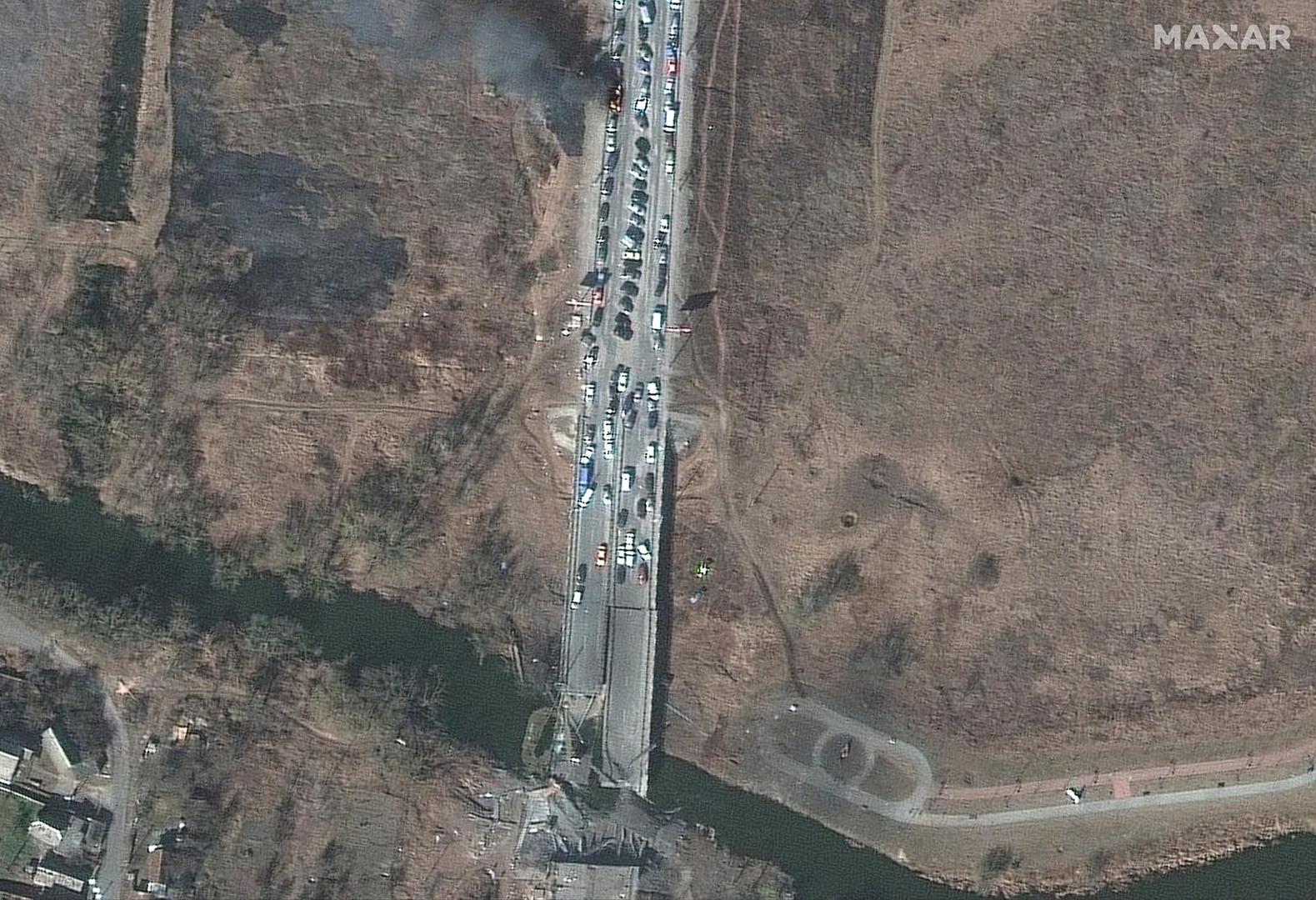 Satellite view of cars on fire near Irpin River bridge, Kyiv region, as Russia's invasion of Ukraine continues, in Irpin March 18, 2022 in this handout. Satellite image (C) 2022 Maxar Technologies/Handout via REUTERS ATTENTION EDITORS - THIS IMAGE HAS BEEN SUPPLIED BY A THIRD PARTY. MANDATORY CREDIT. WATERMARK MAY NOT BE REMOVED/CROPPED. NO RESALES. NO ARCHIVES Photo: MAXAR TECHNOLOGIES/REUTERS