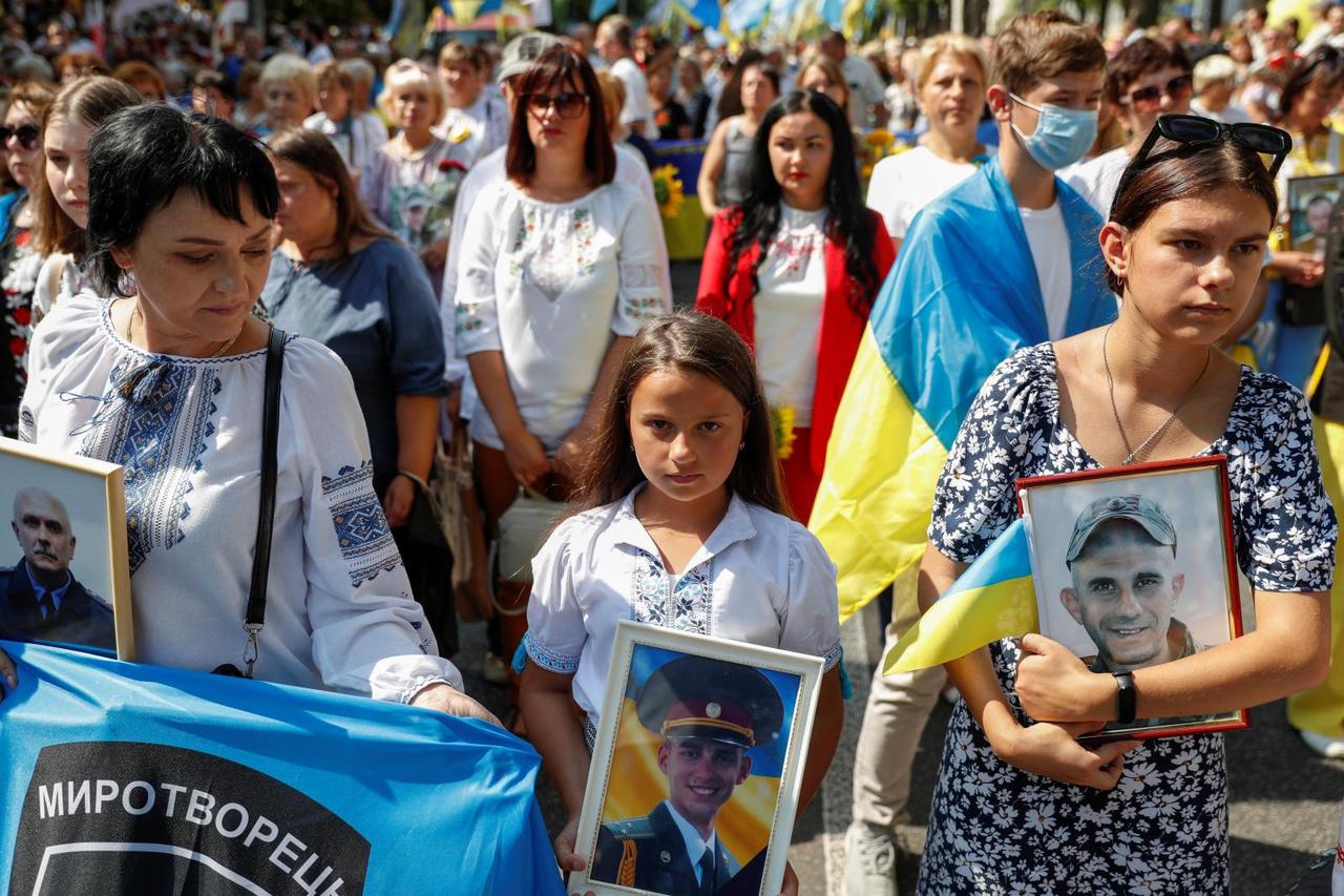 People take part in the March of Defenders of Ukraine on Independence Day in Kyiv