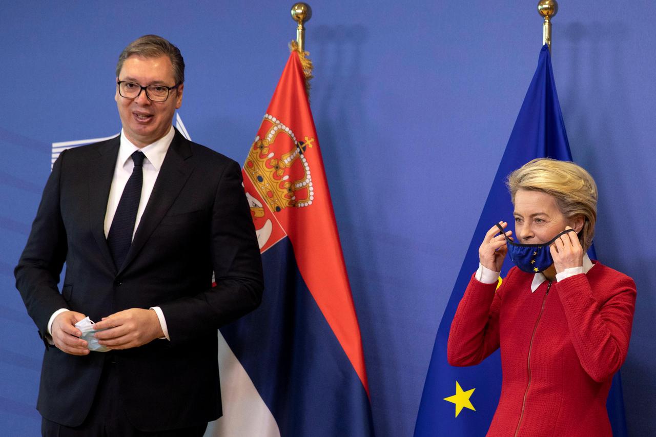 FILE PHOTO: EU's von der Leyen and Serbian President Vucic pose for photographers prior to a meeting in Brussels