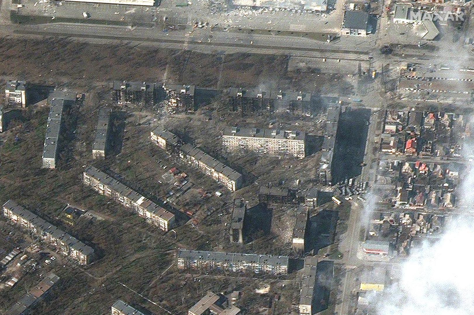 Satellite view of burning, heavily damaged apartment buildings and stores, as Russia's invasion of Ukraine continues, Mariupol, March 18, 2022 in this handout. Satellite image (C) 2022 Maxar Technologies/Handout via REUTERS ATTENTION EDITORS - THIS IMAGE HAS BEEN SUPPLIED BY A THIRD PARTY. MANDATORY CREDIT. WATERMARK MAY NOT BE REMOVED/CROPPED. NO RESALES. NO ARCHIVES Photo: MAXAR TECHNOLOGIES/REUTERS