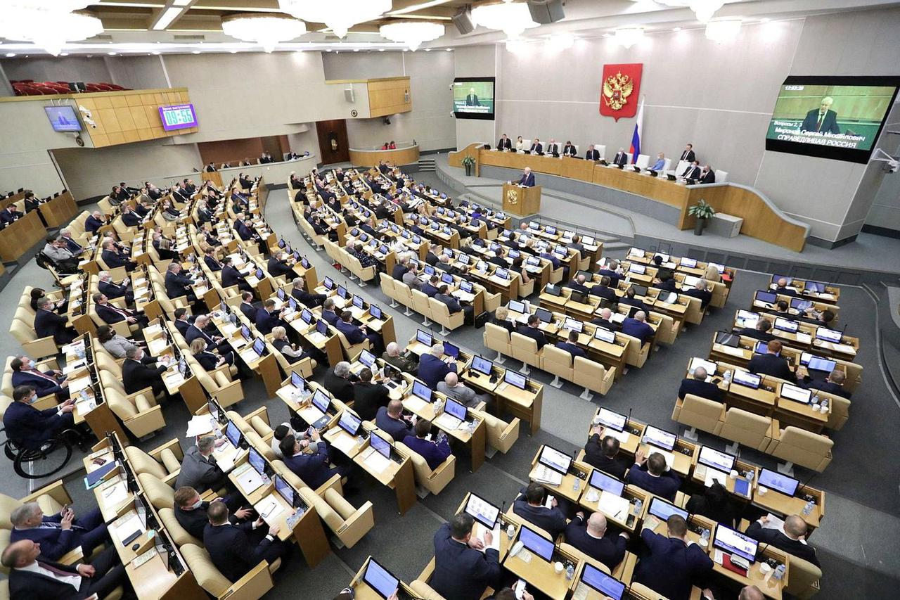 FILE PHOTO: Russian lawmakers attend a session of the lower house of parliament in Moscow