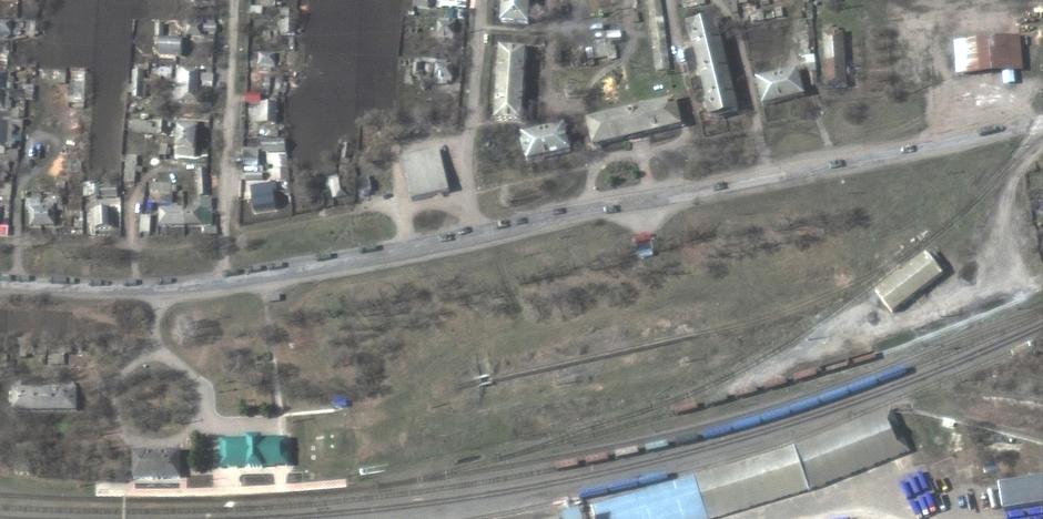 A satellite image shows convoy of military forces heading south toward Donbas region