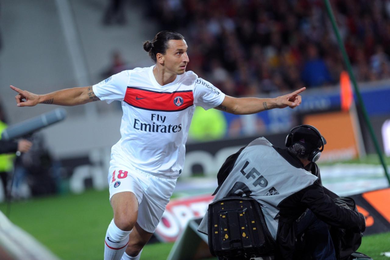 'Paris Saint-Germain\'s Swedish forward Zlatan Ibrahimovic celebrates after scoring a goal during the French L1 football match LOSC Lille vs Paris Saint-Germain (PSG) on September 2, 2012 at the Grand