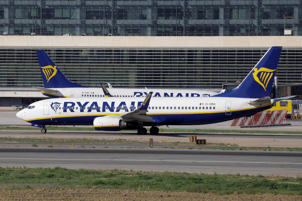 FILE PHOTO: Two Boeing 737-8AS passenger aircrafts of Ryanair airline, taxi on a runway at Malaga-Costa del Sol airport, in Malaga