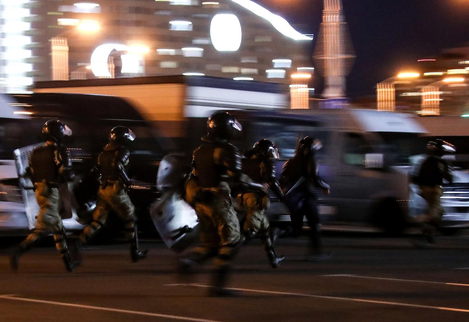 MINSK, BELARUS - AUGUST 11, 2020: Belarusian law enforcement officers run during a protest against the results of the 2020 Belarusian presidential election. Mass protests erupted in major cities across Belarus in the evening of August 9. Valery Sharifulin/TASS	 Photo via Newscom Newscom/PIXSELL