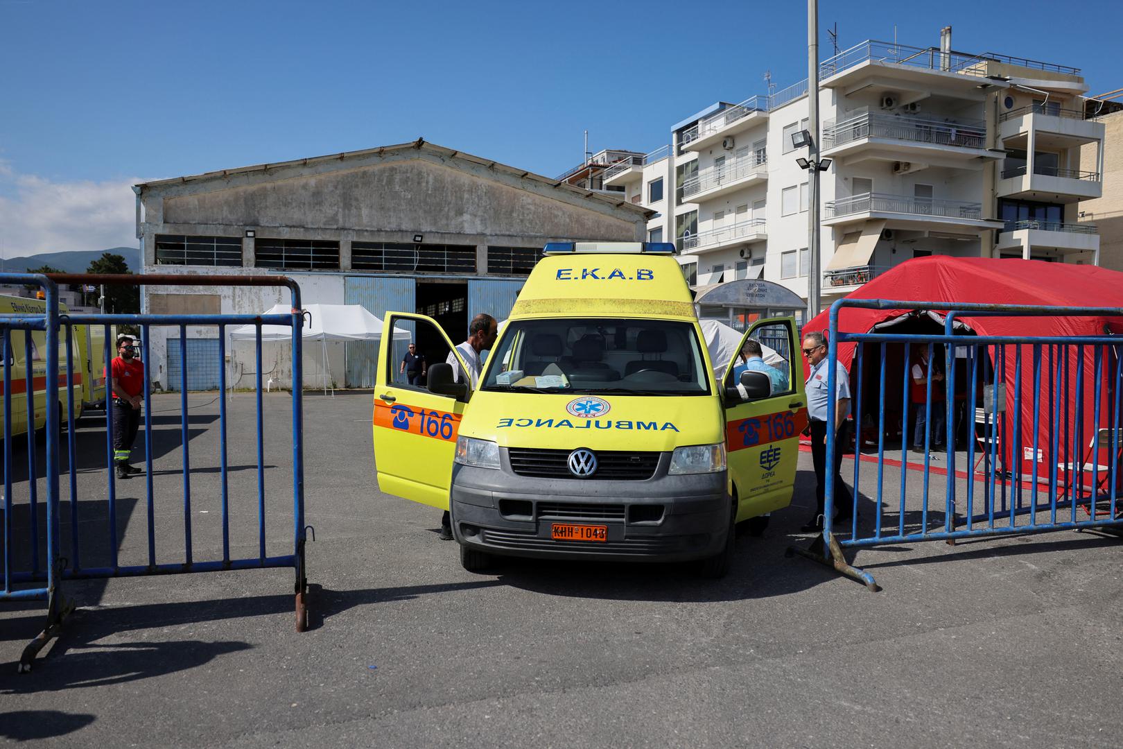 An ambulance is seen outside a shelter where migrants were transferred, following a rescue operation, after their boat capsized at open sea, in Kalamata, Greece, June 14, 2023. REUTERS/Stelios Misinas Photo: STELIOS MISINAS/REUTERS