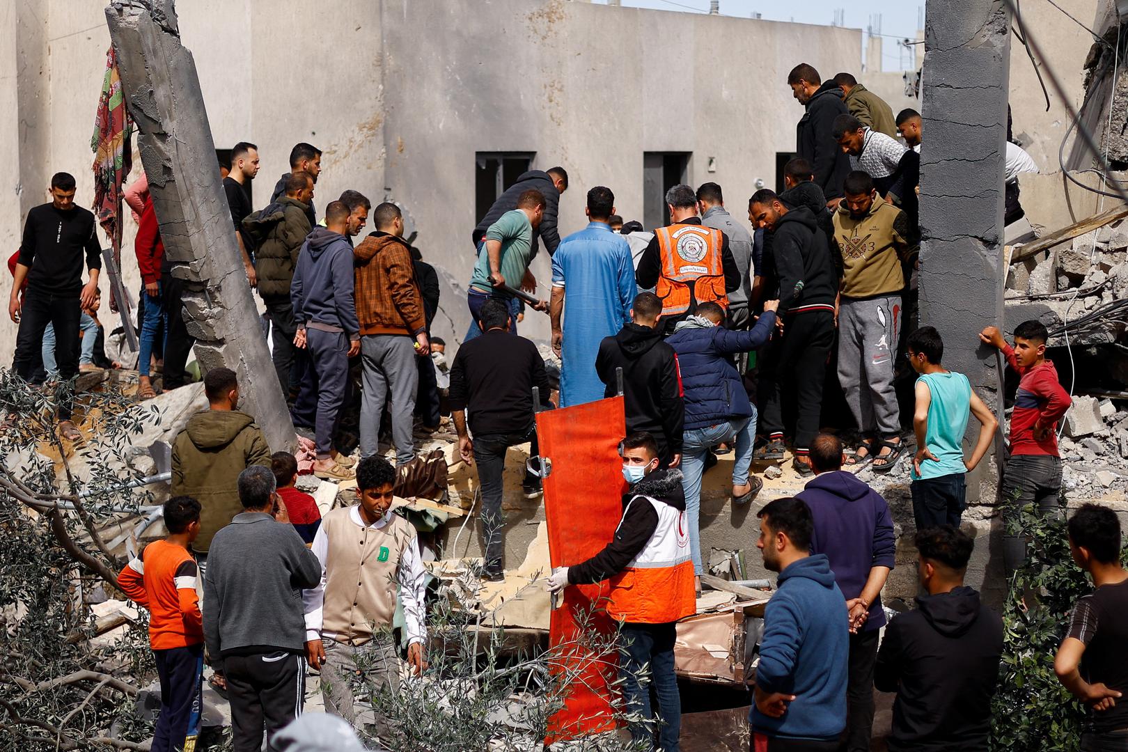 Palestinians gather at the site of an Israeli strike on a house, amid the ongoing conflict between Israel and Hamas, in Rafah in the southern Gaza Strip, March 1, 2024. REUTERS/Ibraheem Abu Mustafa Photo: IBRAHEEM ABU MUSTAFA/REUTERS