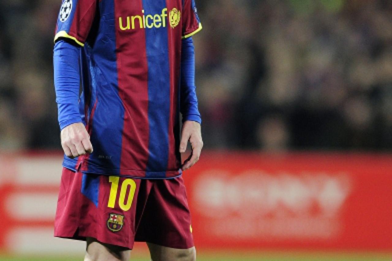 'Barcelona\'s Argentinian forward Lionel Messi reacts during their Champions League round of 16, 2nd leg football match FC Barcelona vs Arsenal on March 8, 2011 at Camp Nou stadium in Barcelona. AFP P