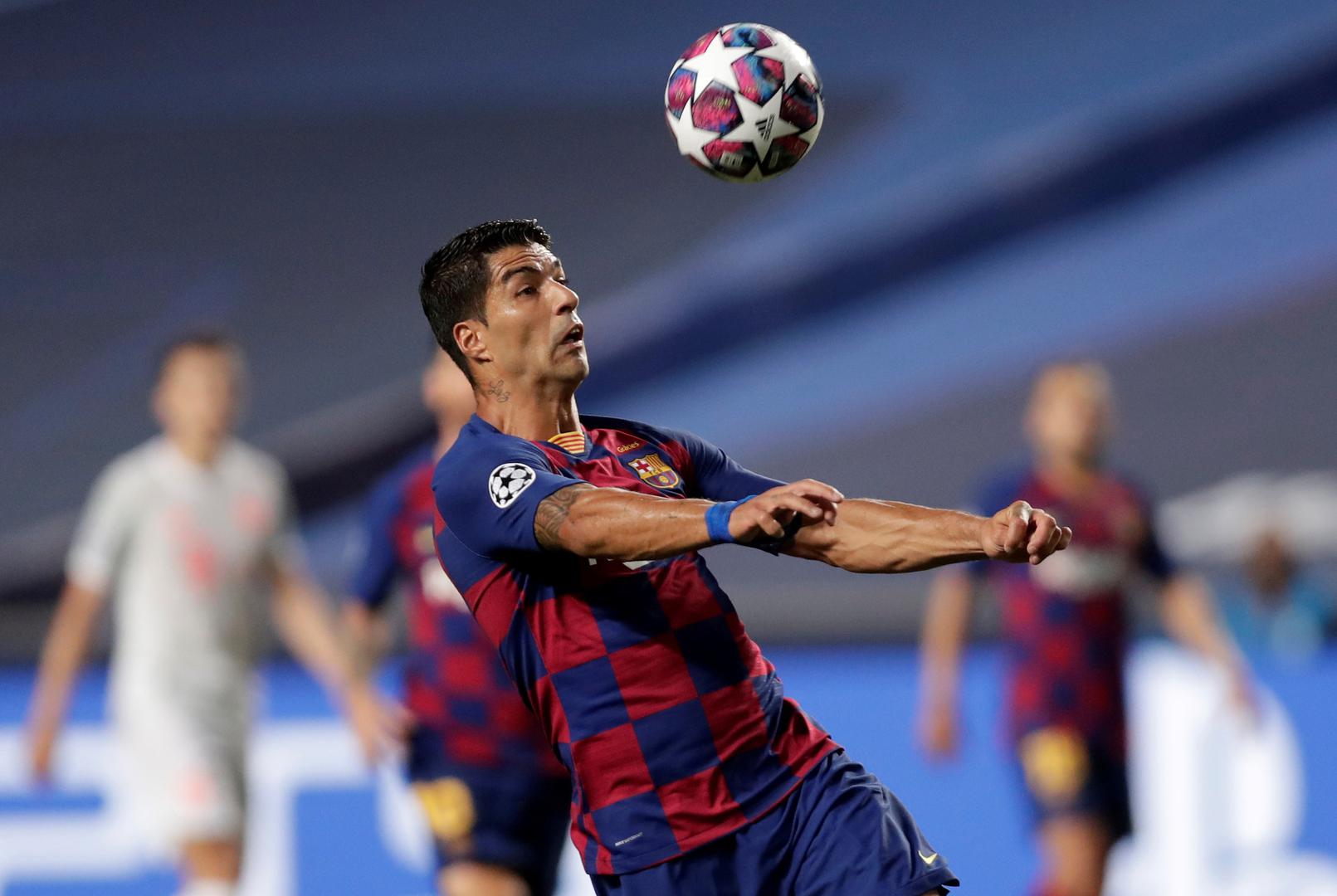 FILE PHOTO: Champions League - Quarter Final - FC Barcelona v Bayern Munich FILE PHOTO: Soccer Football - Champions League - Quarter Final - FC Barcelona v Bayern Munich - Estadio da Luz, Lisbon, Portugal - August 14, 2020  Barcelona's Luis Suarez in action, as play resumes behind closed doors following the outbreak of the coronavirus disease (COVID-19)  Manu Fernandez/Pool via REUTERS/File Photo POOL