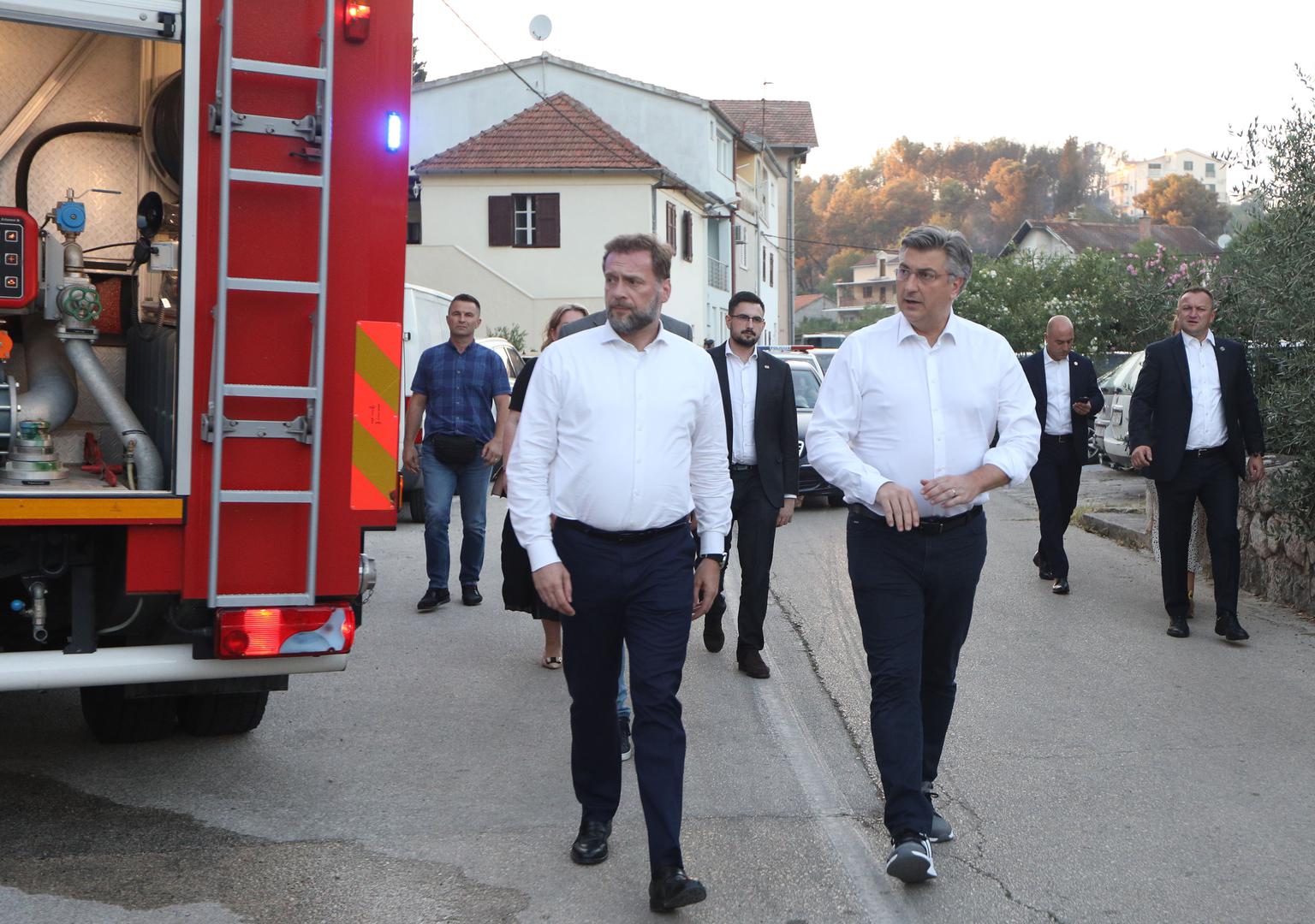 13.07.2022., Zaton - Premijer Andrej Plenkovic stigao je s ministrima u Zaton, gdje se sastao s vatrogascima i ostalim interventnim sluzbama. Nakon sastanka ispred Vatrogasnog doma u Zatonu dao je izjavu novinarima. Andrej Plenkovic, Mario Banozic. Photo: Dusko Jaramaz/PIXSELL