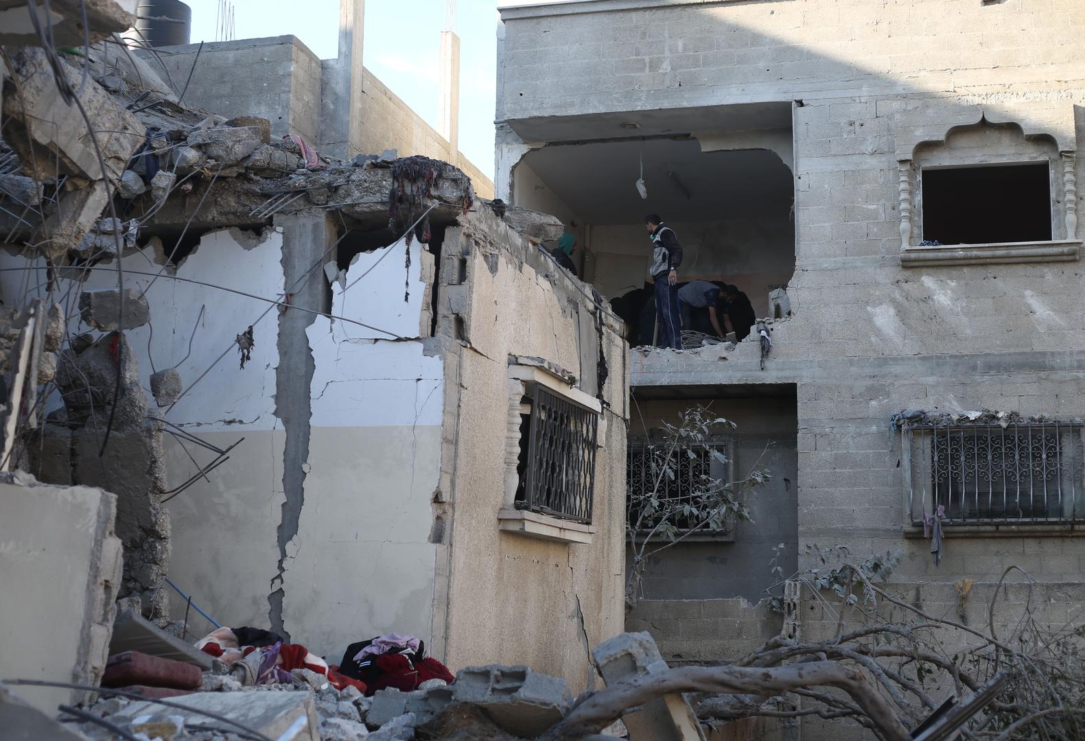 (240221) -- RAFAH, Feb. 21, 2024 (Xinhua) -- People check the rubble of a building destroyed in an Israeli air strike in the southern Gaza Strip city of Rafah, on Feb. 21, 2024. The Palestinian death toll in the Gaza Strip has risen to 29,313, with 69,333 others wounded, as the Israel-Hamas conflict continues, the Hamas-run Health Ministry said in a press statement on Wednesday.    During the past 24 hours, the Israeli army killed 118 Palestinians and wounded 163 others in the coastal enclave, it added. (Photo by Khaled Omar/Xinhua) Photo: Khaled Omar/XINHUA