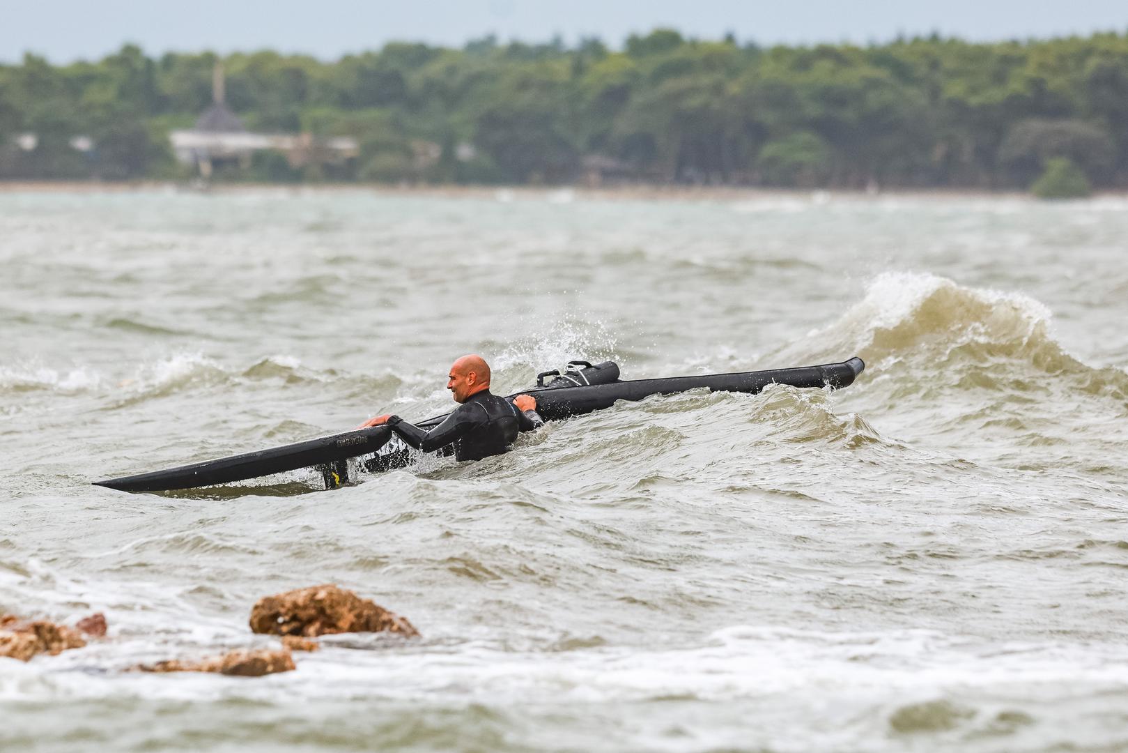 12.09.2024., Umag - Kisa je prvo potopila neke dijelove Umaga, a poslije je jak vjetar izmamio znatizeljne turiste i surfere na more. Photo: Srecko Niketic/PIXSELL