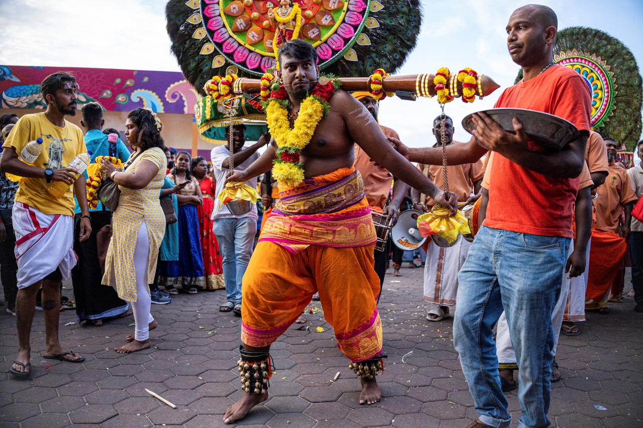 Devotees celebrate Thaipusam with a pilgrimage to Hindu temple in Malaysia