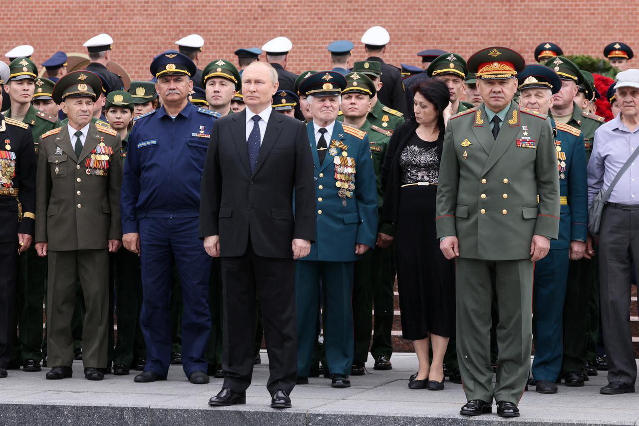 Russian President Vladimir Putin and Defence Minister Sergei Shoigu attend a wreath-laying ceremony in Moscow