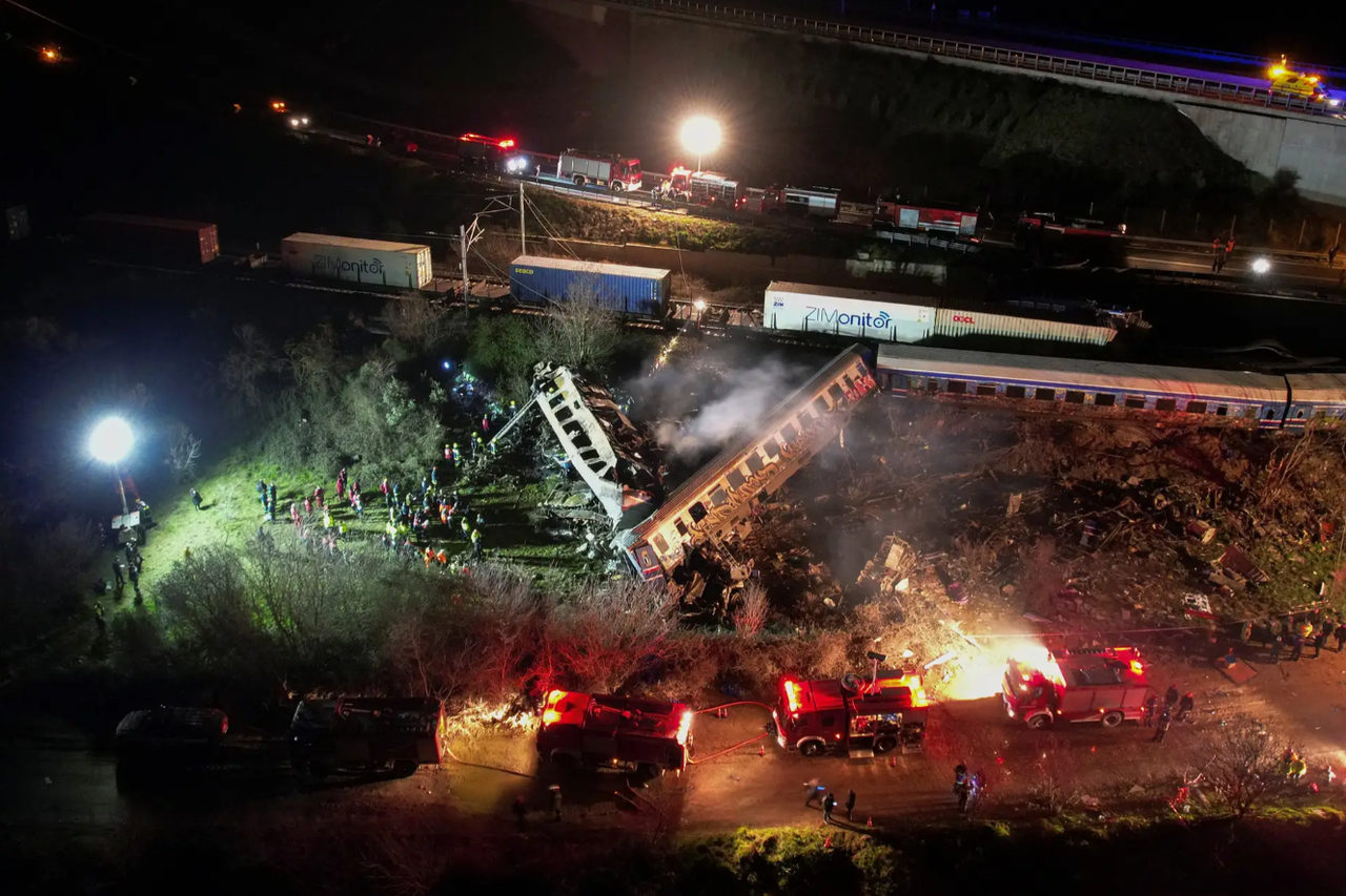 Protesters clash with police during a demonstration after a train crash near the city of Larissa, in Athens