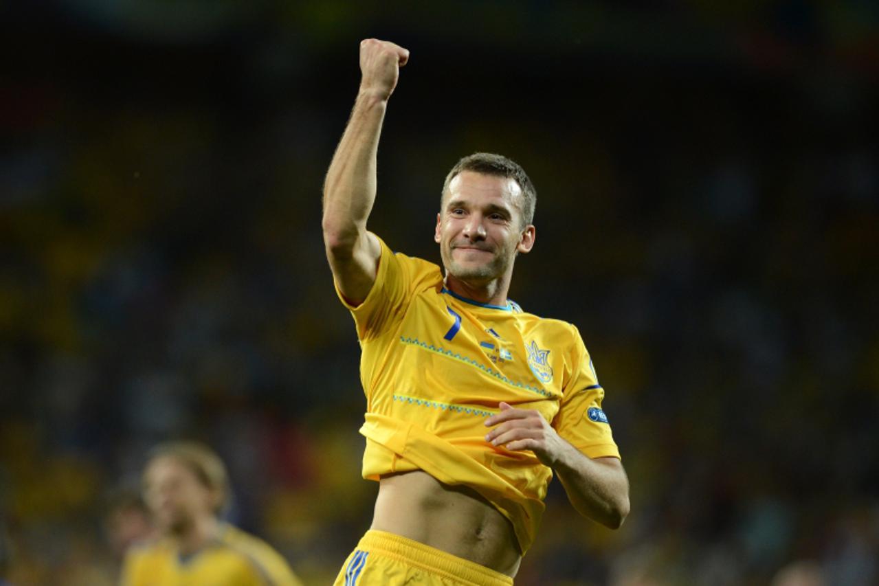 'Ukrainian forward Andriy Shevchenko celebrates at the end of the Euro 2012 championships football match Ukraine vs Sweden on June 11, 2012 at the Olympic Stadium in Kiev. Ukrain won 2 to 1.         A