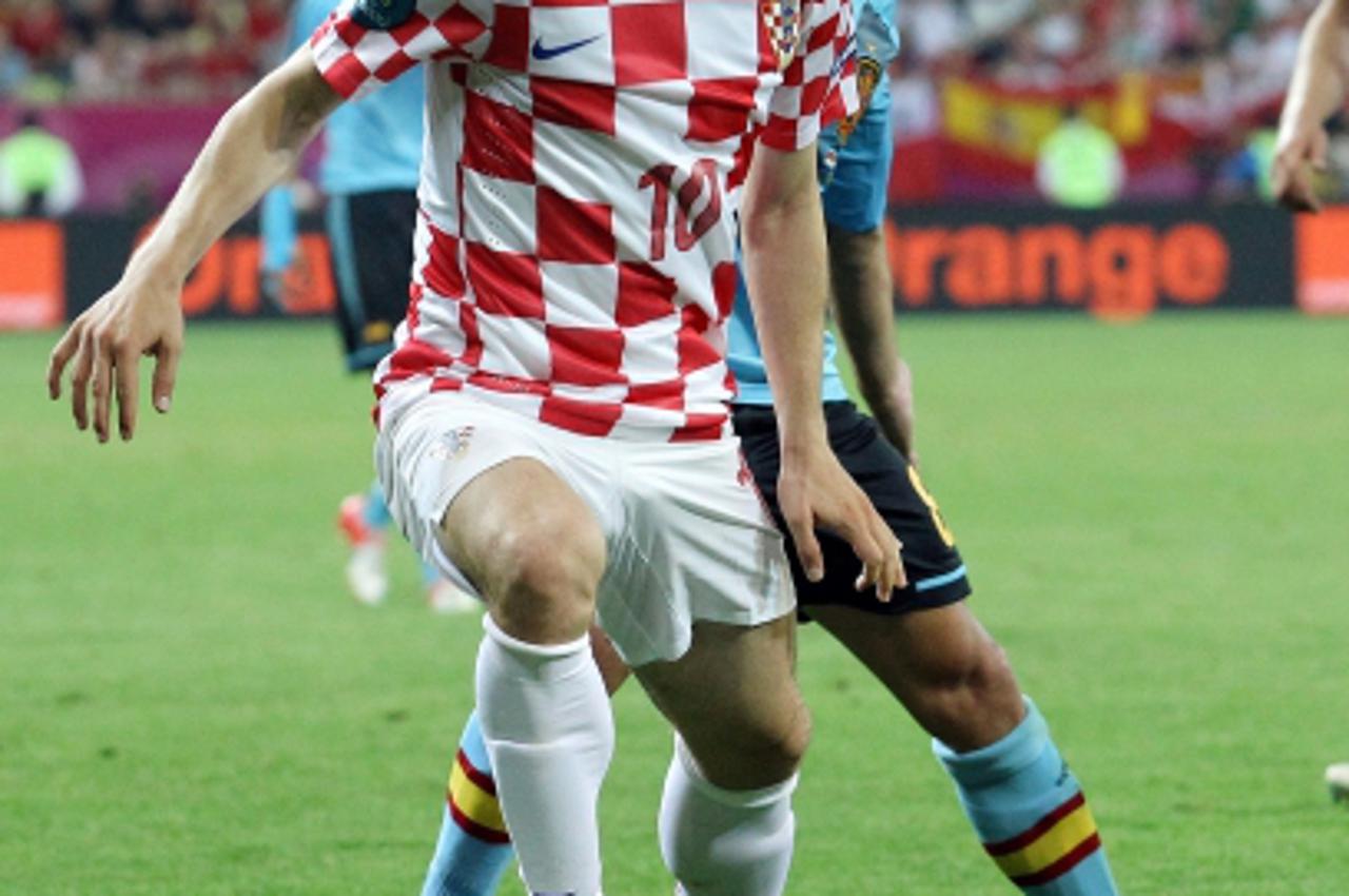 '18.06.2012., Gdanjsk, Poljska - Europsko nogometno prvenstvo Euro 2012. Skupina C, Hrvatska - Spanjolska. Luka Modric, Xavier Hernandez Photo: Goran Stanzl/PIXSELL'