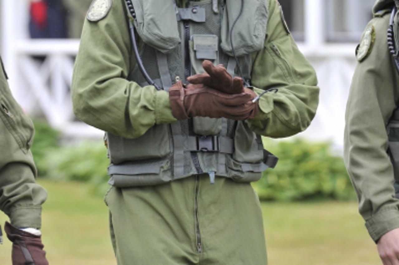 'Prince William, The Duke of Cambridge, heads toward a Sea King helicopter for a training exercise, in Dalvay by-the-Sea, Prince Edward Island, Monday, July 4, 2011. Prince William will pilot a Canadi