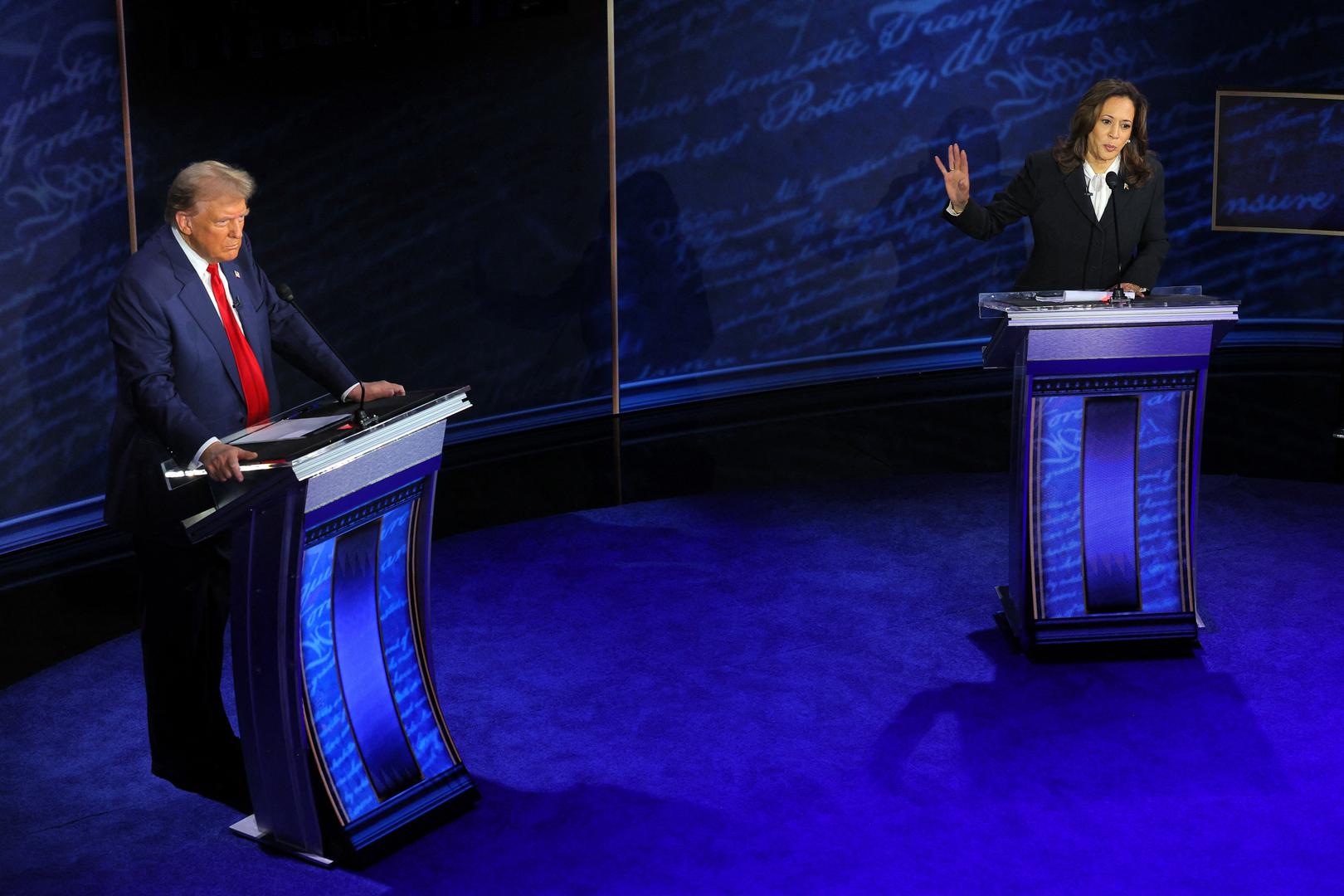 Democratic presidential nominee, U.S. Vice President Kamala Harris speaks during a presidential debate hosted by ABC as Republican presidential nominee, former U.S. President Donald Trump listens, in Philadelphia, Pennsylvania, U.S., September 10, 2024. REUTERS/Brian Snyder Photo: BRIAN SNYDER/REUTERS