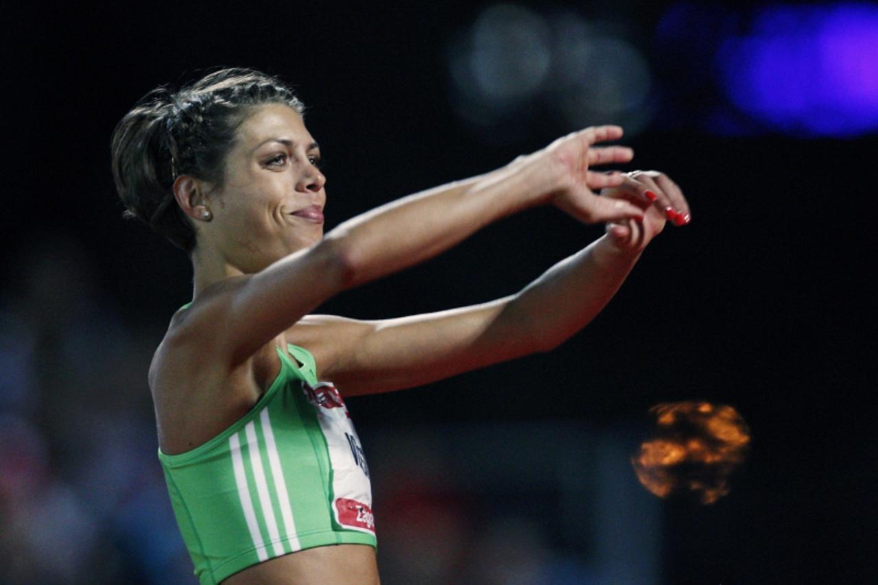 'Blanka Vlasic of Croatia celebrates after winning gold in the women\'s high jump event during the IAAF World Challenge Zagreb 2010 in Zagreb September 1, 2010. REUTERS/Nikola Solic (CROATIA - Tags: S