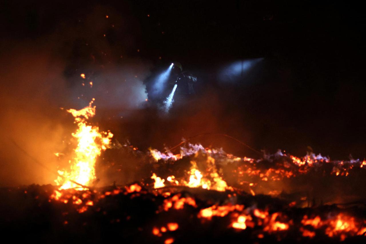 The Wider Image: Ukraine firefighters adapt to working in war zone