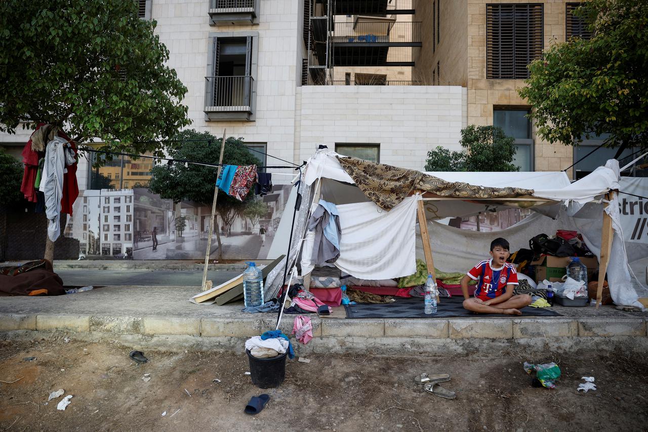 Displaced families shelter amid ongoing conflict, in Beirut