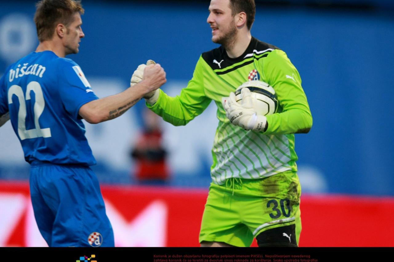 '03.03.2012., Maksimir, Zagreb - Nogometna utakmica 20. kola MAxtv Prve HNL, HNK Dinamo - NK Osijek. Igor Biscan, Ivan Kelava. Photo: Dalibor Urukalovic/PIXSELL'