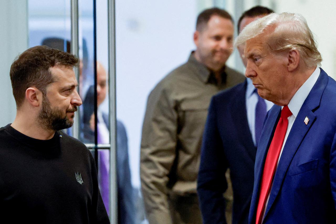 FILE PHOTO: Republican presidential nominee and former U.S. President Donald Trump and Ukraine's President Volodymyr Zelenskiy meet in New York