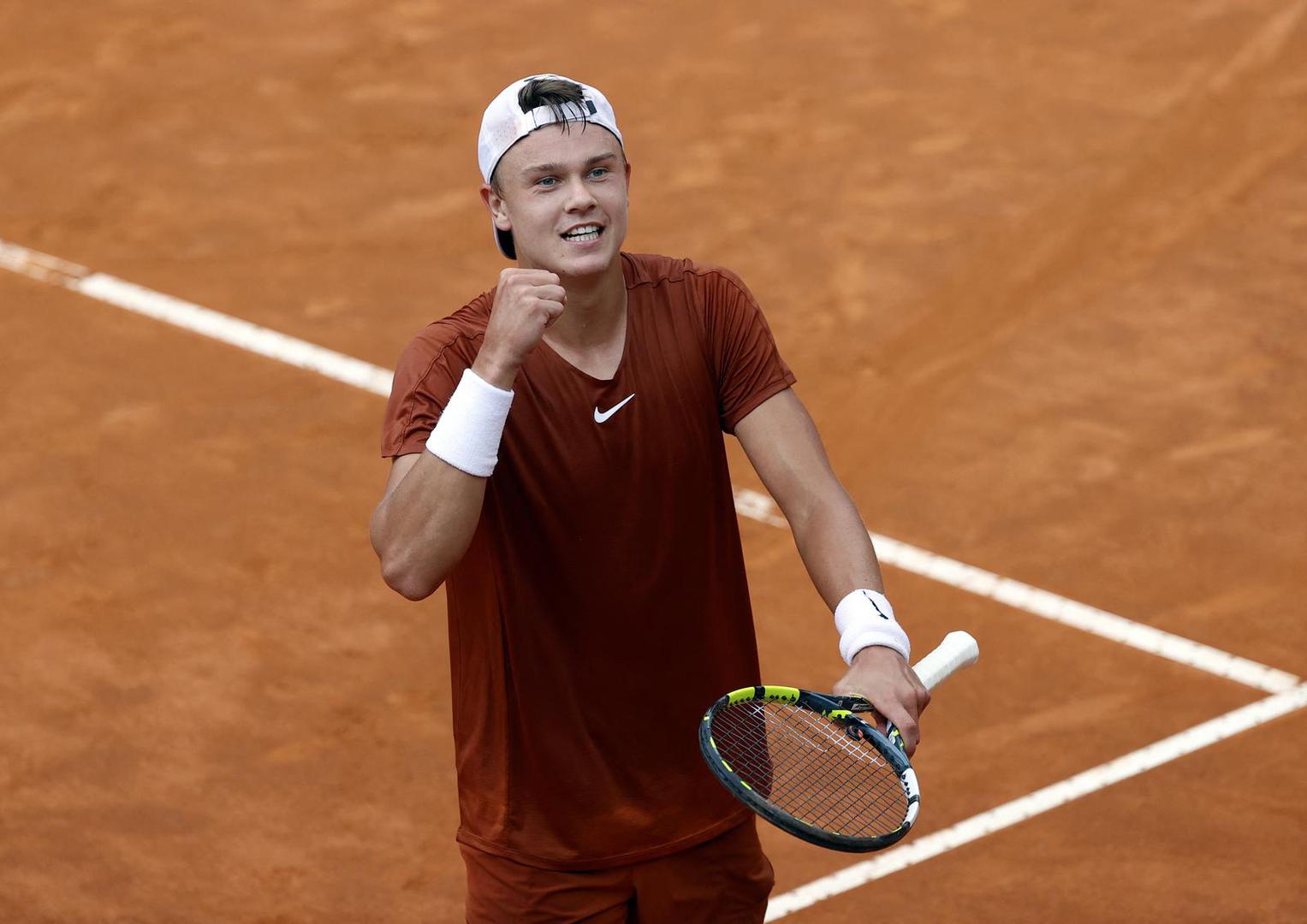 Tennis - Italian Open - Foro Italico, Rome, Italy - May 17, 2023 Denmark's Holger Rune celebrates winning his quarter final match against Serbia's Novak Djokovic REUTERS/Ciro De Luca Photo: CIRO DE LUCA/REUTERS