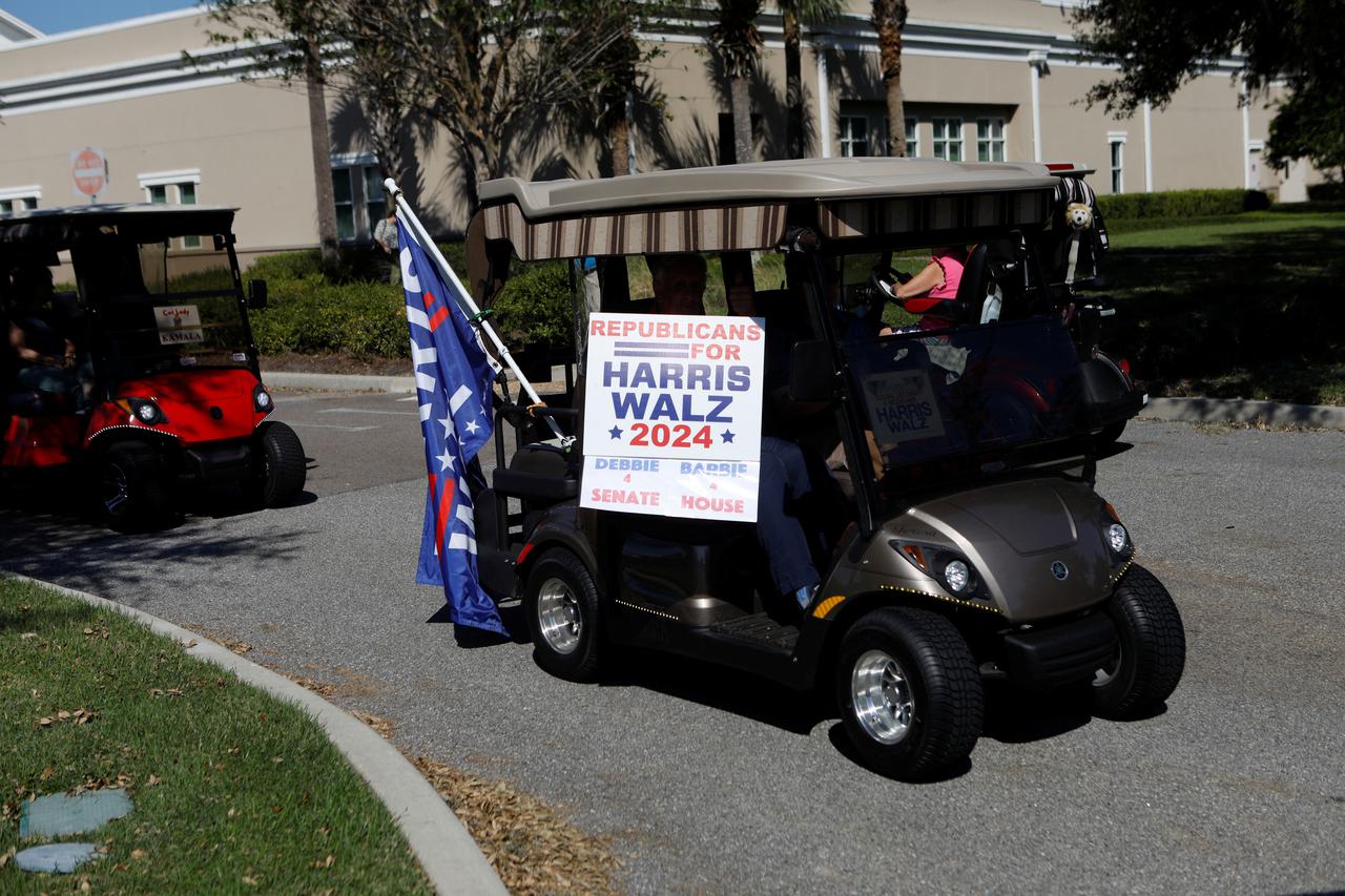 Supporters of U.S. Vice President Harris hold a golf cart rally in The Villages