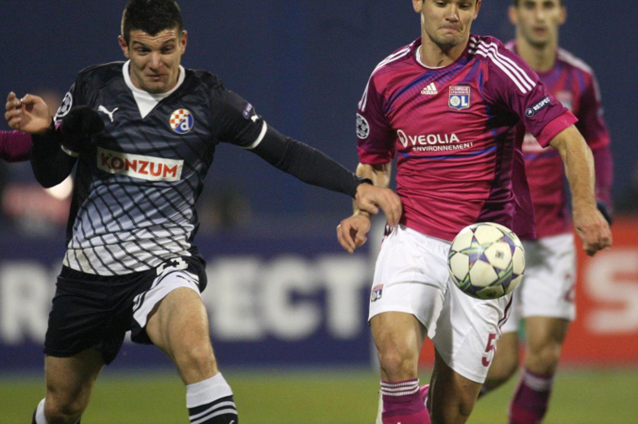 '07.12.2011., stadion u Maksimiru, Zagreb - Liga prvaka, skupina D, 6. kolo, Dinamo Zagreb - Lyon. Fatos Beqiraj, Dejan Lovren.  Photo: Igor Kralj/PIXSELL'