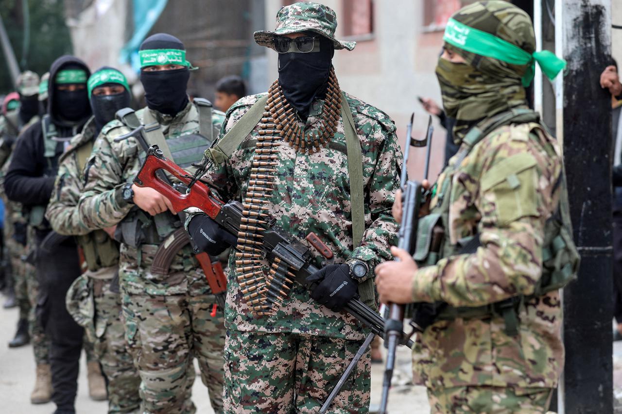 Palestinians attend the funeral of senior Hamas deputy military commander Marwan Issa