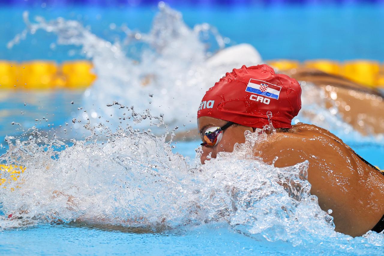 Swimming - Women's 100m Breaststroke - Heats