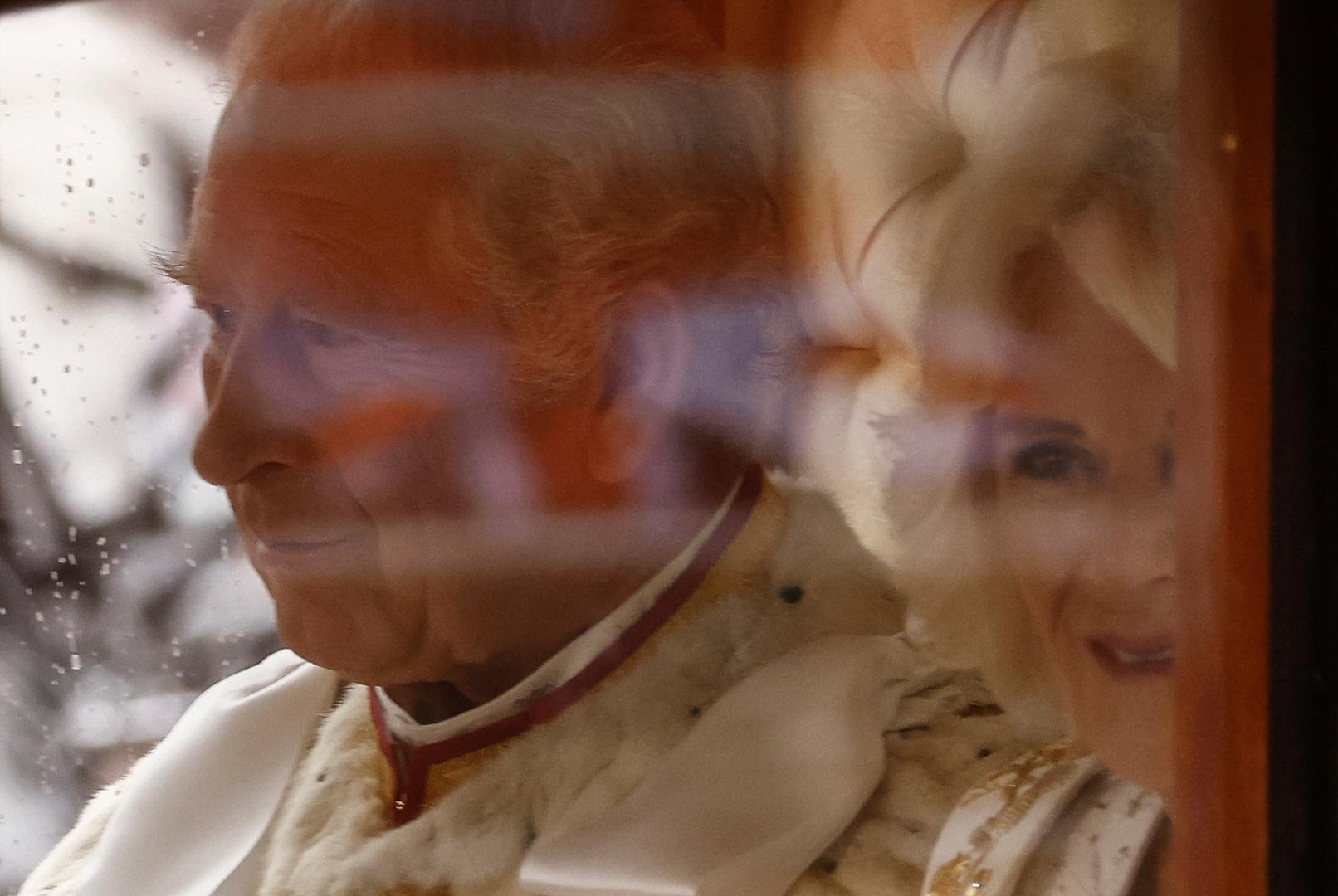 Britain's King Charles and Queen Camilla sit in Diamond Jubilee State Coach on the day of coronation ceremony, at The Mall in London, Britain May 6, 2023. REUTERS/Yara Nardi/Pool Photo: YARA NARDI/REUTERS