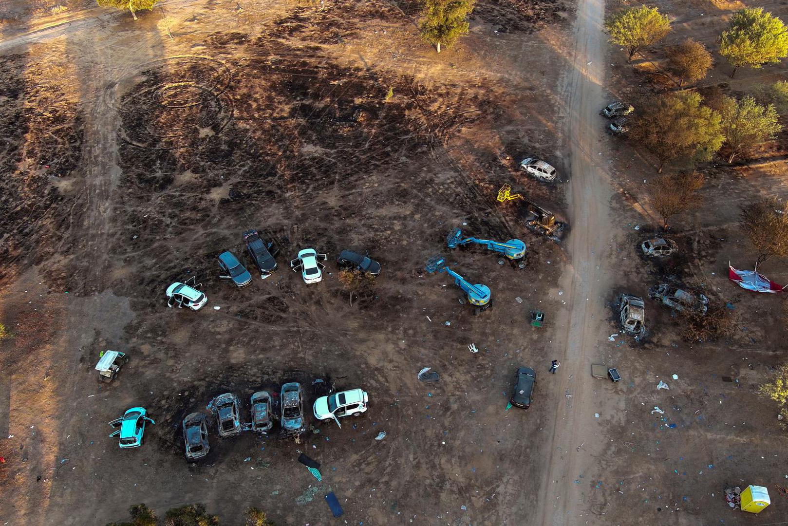 An aerial view shows the burnt cars of festival-goers at the site of an attack on the Nova Festival by Hamas gunmen from Gaza, near Israel's border with the Gaza Strip, in southern Israel, October 12, 2023. REUTERS/Ilan Rosenberg Photo: ILAN ROSENBERG/REUTERS