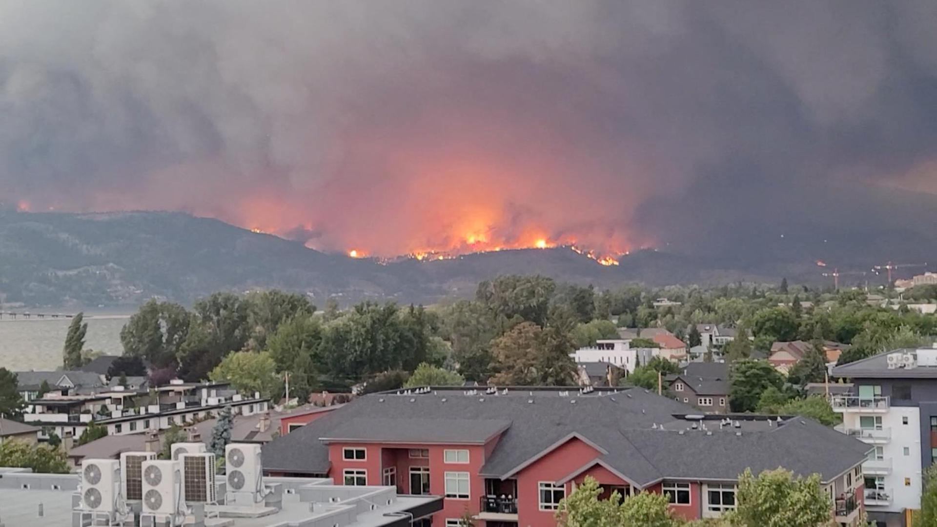 Smoke rises during the wildfire in Kelowna, British Columbia, Canada August 17, 2023, in this screen grab obtained from a social media video. Bonita Kay Summers/via REUTERS  THIS IMAGE HAS BEEN SUPPLIED BY A THIRD PARTY. MANDATORY CREDIT. NO RESALES. NO ARCHIVES. Photo: BONITA KAY SUMMERS/REUTERS