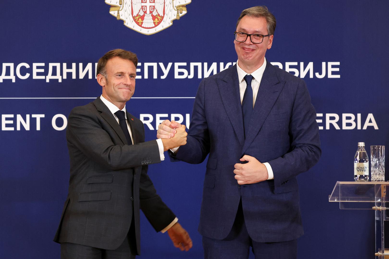 French President Emmanuel Macron and Serbian President Aleksandar Vucic shake hands following a joint press conference at the Palace of Serbia building in Belgrade, Serbia, August 29, 2024. REUTERS/Djordje Kojadinovic Photo: DJORDJE KOJADINOVIC/REUTERS