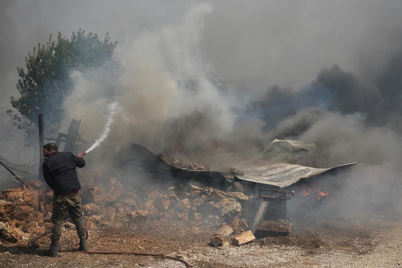 Wildfire burns in Nea Penteli, near Athens