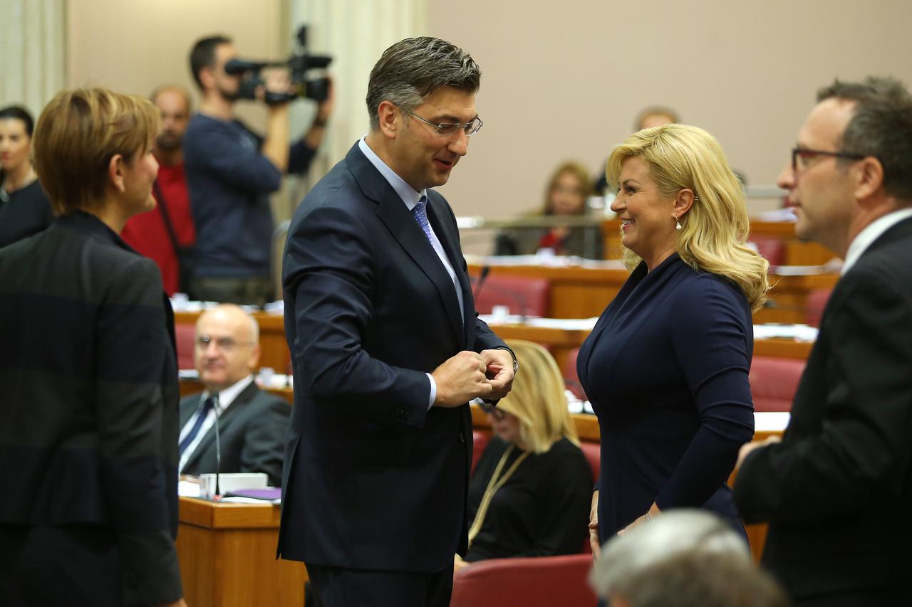 19.10.2016., Zagreb - Mandatar Andrej Plenkovic na prvoj sjednici 9. saziva Hrvatskog sabora predstavio je program Vlade i njezine clanove te je od zastupnika zatrazio da mu iskazu povjerenje. Andrej Plenkovic, predsjednica RH Kolinda Grabar-Kitarovic. Ph