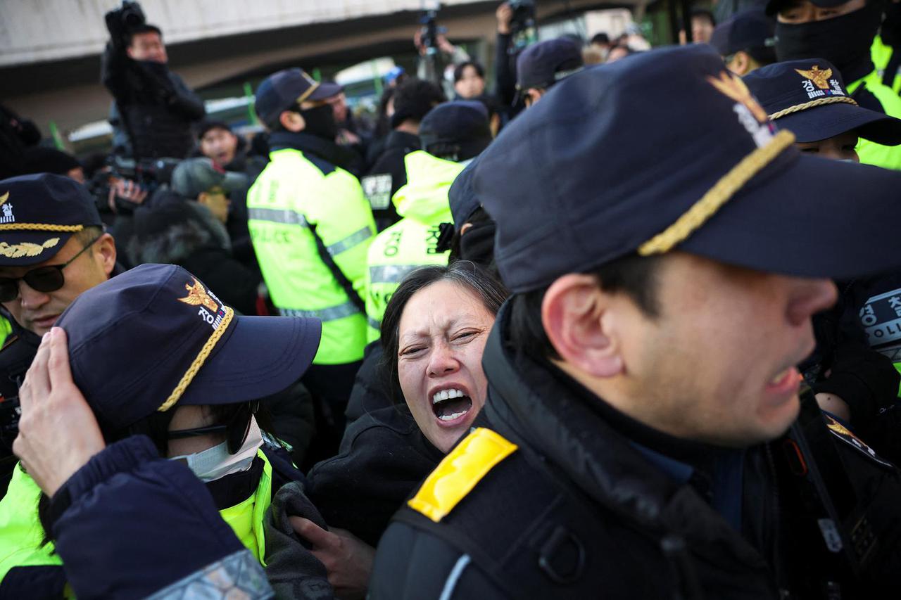 South Korean court issues arrest warrant for impeached President Yoon