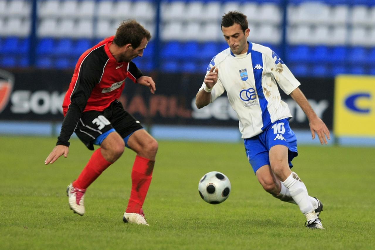 '27.10.2010., Osijek - Hrvatski nogometni kup, osmina finala, NK Osijek - HNK Sibenik.Josip Lukacevic i Zeljko Malcic Photo: Davor Javorovic/PIXSELL'