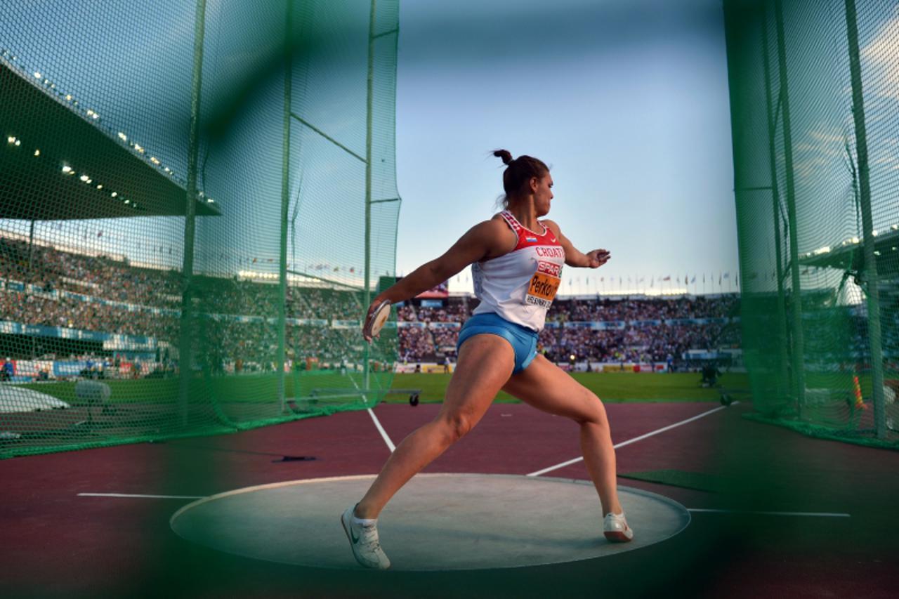 'Croatia\'s Sandra Perkovic competes in the women\'s discus throw final at the 2012 European Athletics Championships at the Olympic Stadium in Helsinki on July 1, 2012. AFP PHOTO / JOHANNES EISELE '