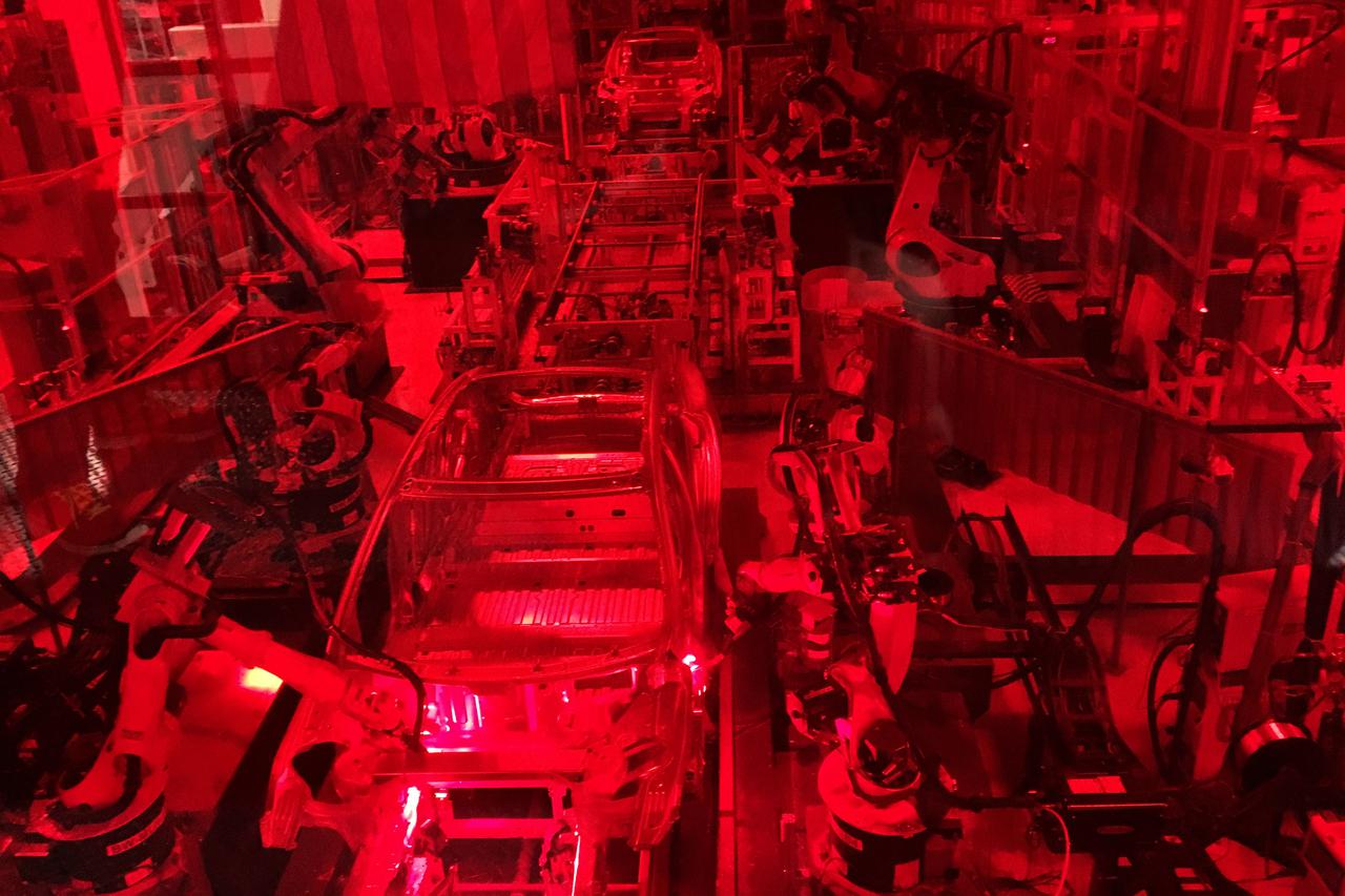 Tesla vehicle bodies being welded at Tesla Motors Inc factory in Fremont