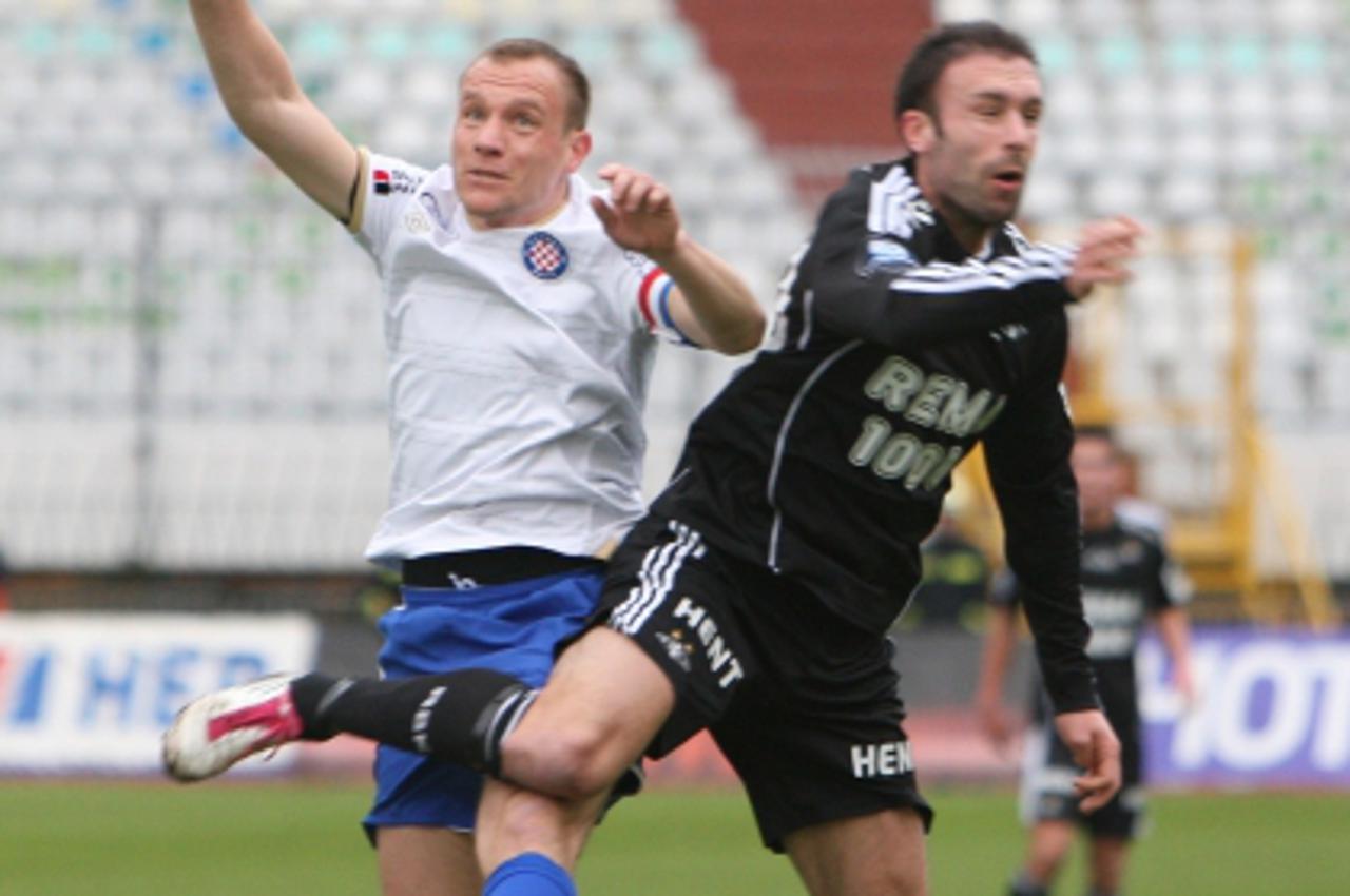 'Split.11.12.2010. Prijateljska medjunarodna nogometna utakmica izmedju HNK Hajduk i Roesnborg BK u Poljudu. Ante Vukusic,strijelac za 1:0. Andric i Prica u skoku za loptu. Photo: Ivo Cagalj/PIXSELL'