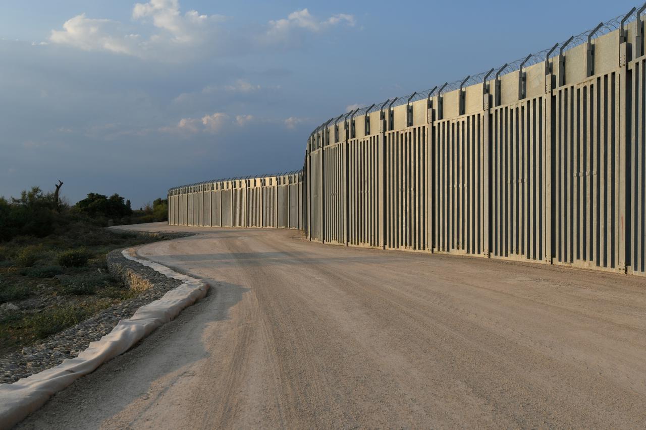 FILE PHOTO: View of a border fence between Greece and Turkey, in Alexandroupolis