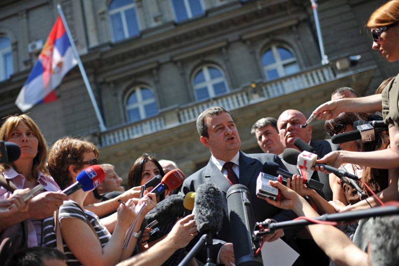 'Serbian Socialist leader Ivica Dacic (C) adresses the press after his meeting with the Serbian President in Belgrade on June 28, 2012. Ivica Dacic received the mandate to form a government with the n