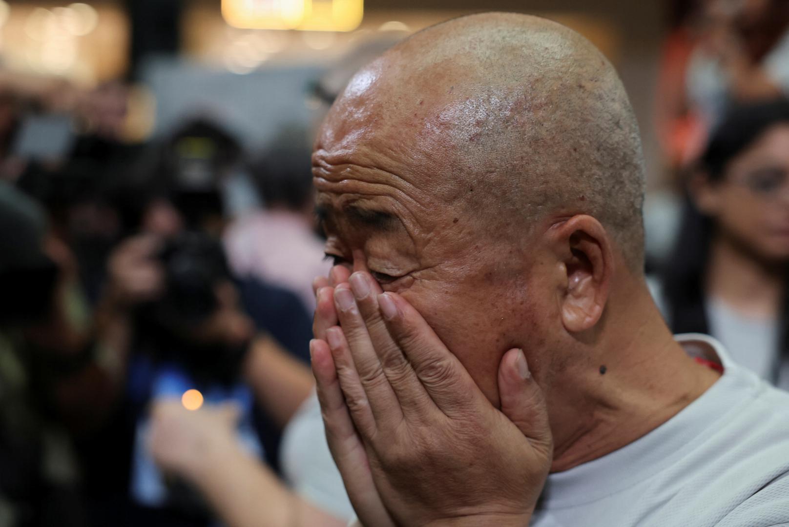 A family member of the missing Malaysia Airlines flight MH370 reacts during a remembrance event marking the 10th anniversary of its disappearance, in Subang Jaya, Malaysia March 3, 2024. REUTERS/Hasnoor Hussain Photo: HASNOOR HUSSAIN/REUTERS