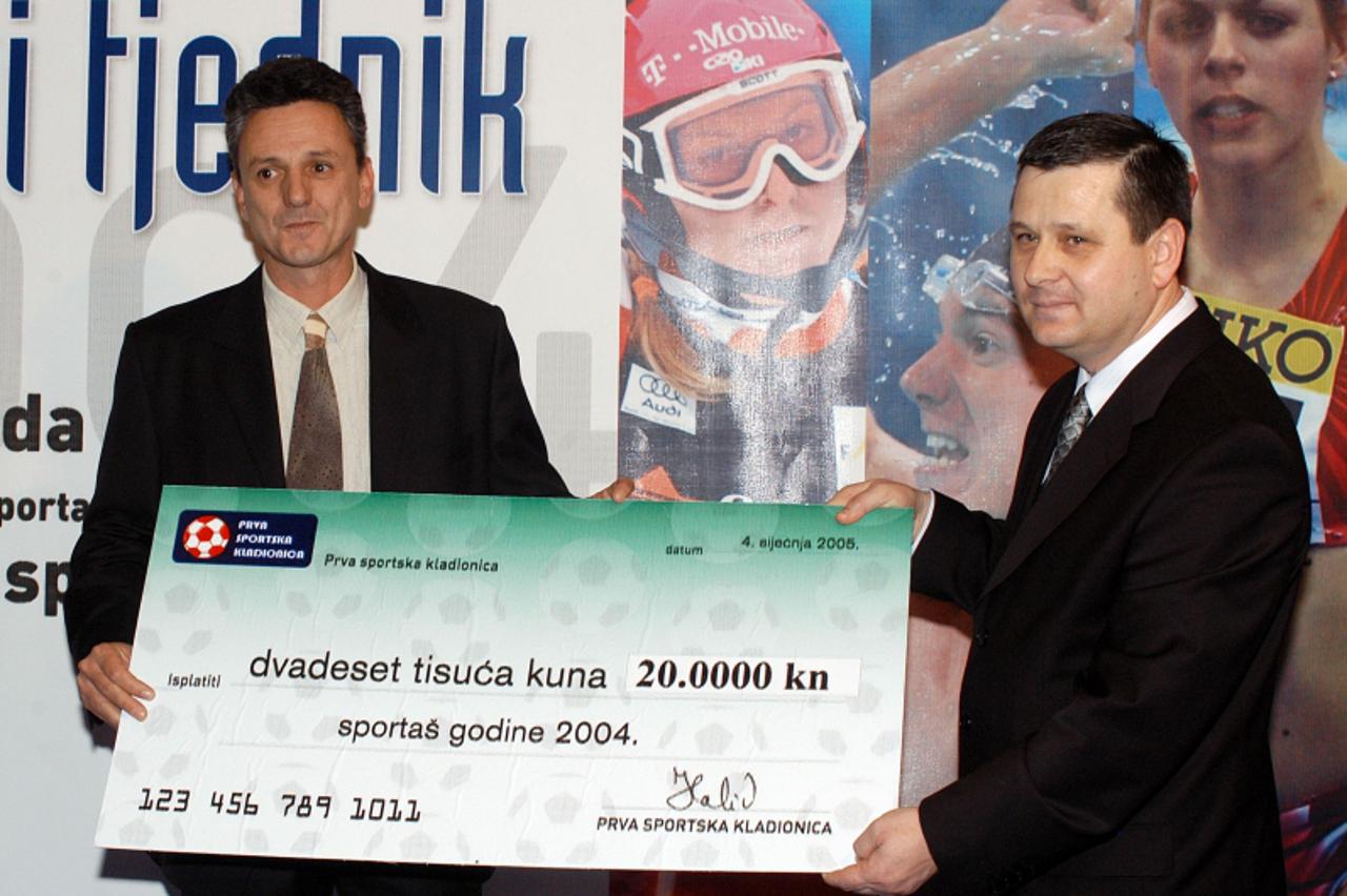 'sport...zagreb...04.01.2004. gap, sportski tjednik psk, proglasenje sportasa godine, sportas godine duje draganja, nagradu je preuzeo njegov otac foto: goran stanzl'