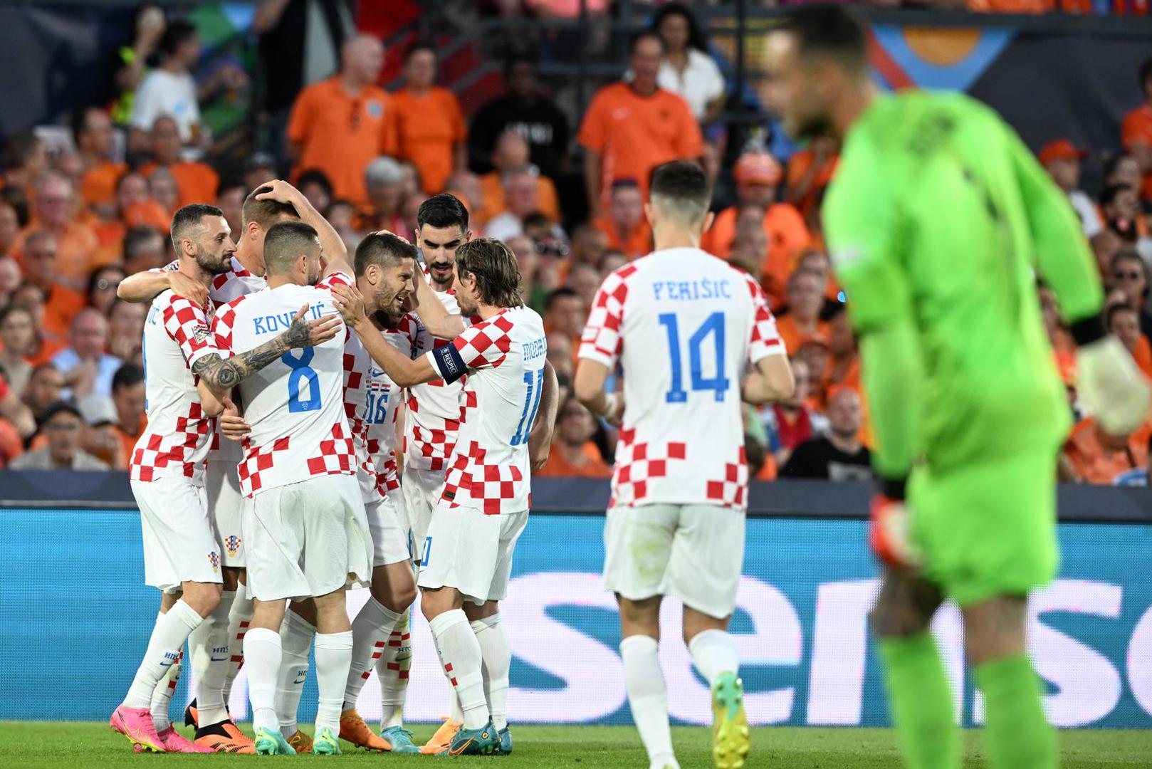 14.06.2023., stadion Feyenoord "De Kuip", Rotterdam, Nizozemska - UEFA Liga Nacija, polufinale, Nizozemska - Hrvatska. Hrvatski nogometasi slave pogodak za 1:1 Photo: Marko Lukunic/PIXSELL